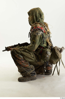 Photos John Hopkins Army Postapocalyptic Suit Poses kneeling whole body…